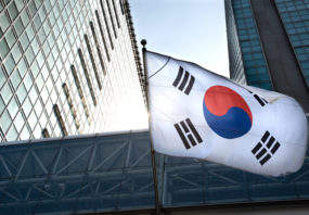 The South Korean flag hanging in a high-rise building