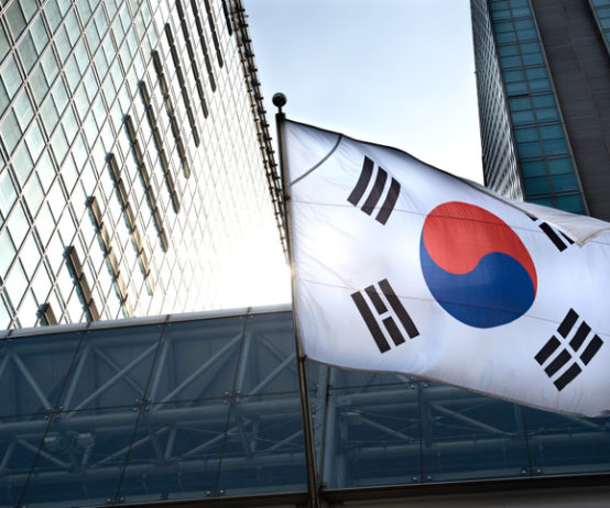 The South Korean flag hanging in a high-rise building