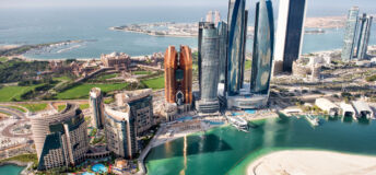 Image of the Abu Dhabi skyline during daytime.