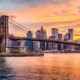 Image of the New York City skyline, featuring the Manhattan Bridge.