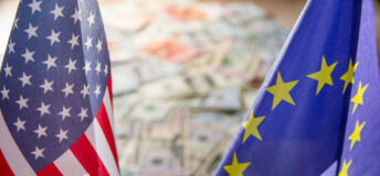 US Dollar and Euro on flags of the United States and European Union.