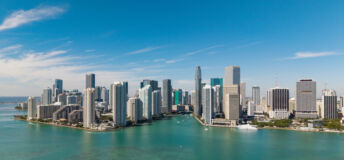 Panoramic modern architecture in Miami downtown, Florida. Miami skyline panoramic view. Aerial view of cityscape with skyscraper in Brickell Key, United States. Downtown Brickell Miami.