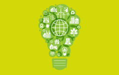 Visualisation of sustainability, represented by a green light bulb constructed of green circles.