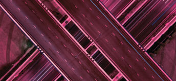 Criss-crossing highways with a red cast.