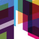 Coloured, translucent isometric shapes overlapping each other