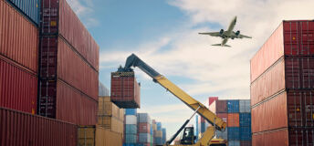 Image of shipping containers and an airplane.