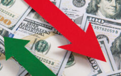 Image of two arrows descending and ascending, respectively, over $100 bills.