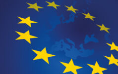 Image of the European Union flag laid over a map of Europe.