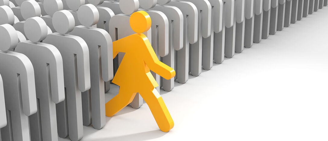 Yellow stick person steps out of a crowd of grey stick people