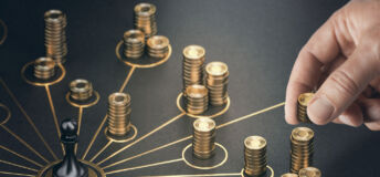 Man puting golden coins on a board representing multiple streams of income. Concept of multiplying sources of revenue. Composite image between a 3d illustration and a photography.