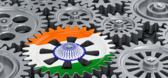 Indian flag on the gearwheel, business industrial concept. 3D rendering