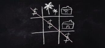 A game of naughts and crosses on a blackboard, but with dollar signs making a diagonal, with a picture of palm trees and a hotel in other squares