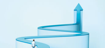 A person walking along a winding path that morphs into an arrow that points up