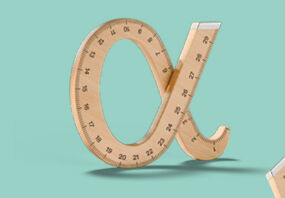 A wooden ruler bent and morphed into the letter alpha