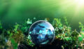 Green energy for clean and sustainable environment. Wind energy used in the industry of factories, machines and technologies. Reducing Co2 emissions and limiting global warming and climate change.