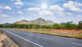 Alpha Alternativesโ India-focused fund approaches $600m final close โ exclusive A Highway from Tirichi to Madurai, South India with trees around under a cloudy sky