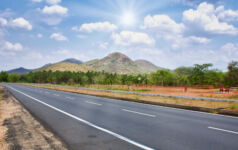 Alpha Alternatives’ India-focused fund approaches $600m final close – exclusive A Highway from Tirichi to Madurai, South India with trees around under a cloudy sky